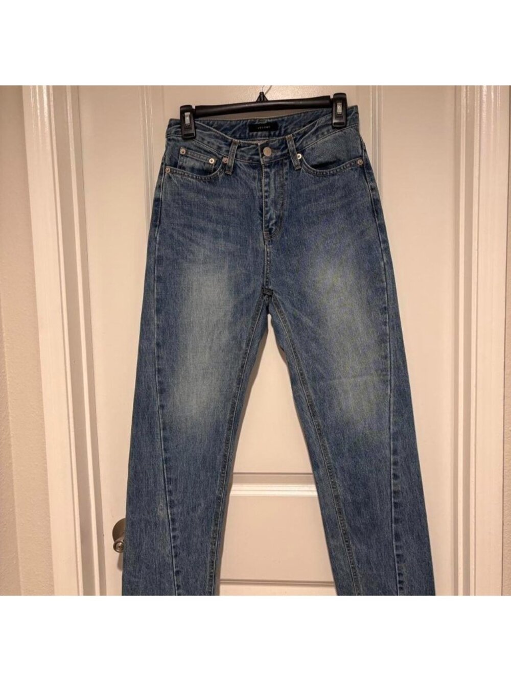 Jelome vintage blue denim jeans with diagonal stitching detail